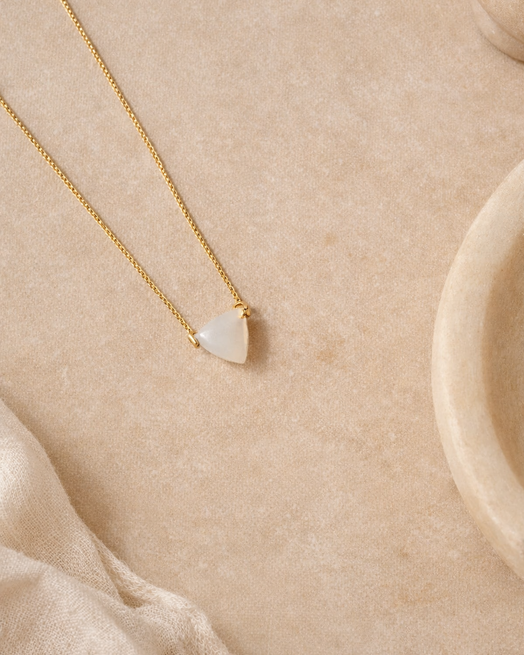 white moonstone mens tikona pendant on chain showing soft glowing stone