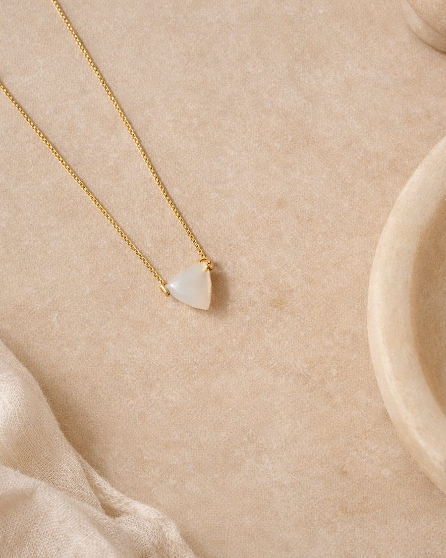 white moonstone mens tikona pendant on chain showing soft glowing stone